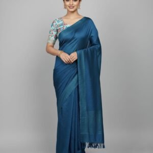 the cream colored body features large, circular woven zari buttas saree (copy)